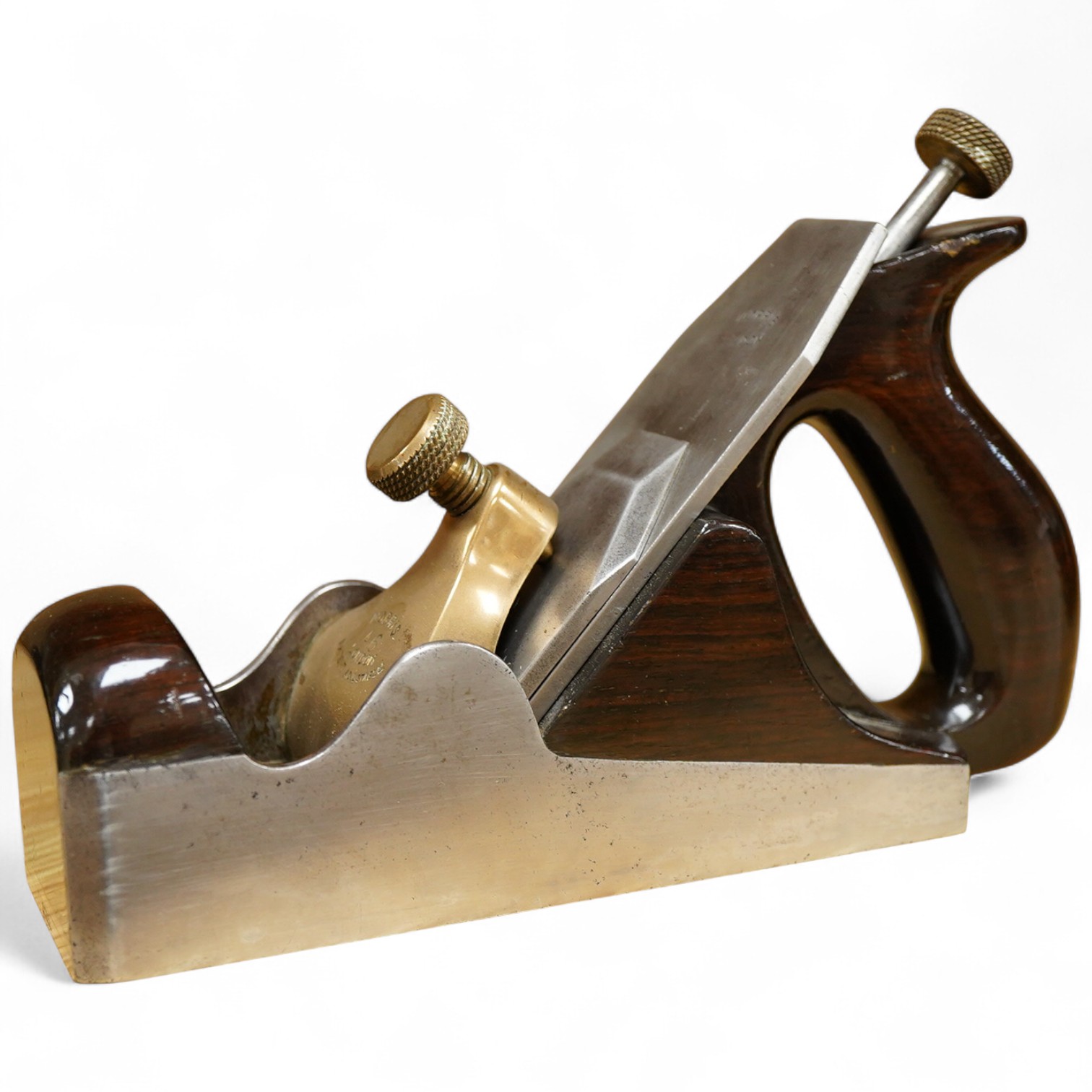 A Norris A6 adjustable smoothing plane, stamped with Norris, London to both the brass lever cap and the iron, with owner’s name lightly stamped to the infill